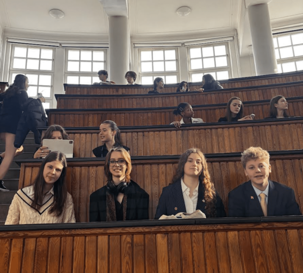 Our journey to Warsaw began with a long train ride and a delicious dinner at a bustling food market. The next day, we attended a briefing at the Palace of Culture and Science, where diplomats introduced us to key topics for debate.